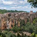 view of the cliff with the village of calcata Italy from the road