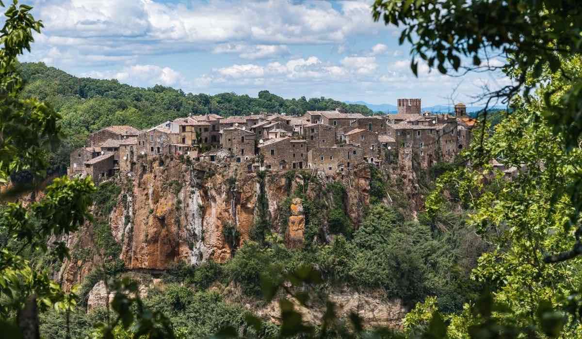 view of the cliff with the village of calcata Italy from the road